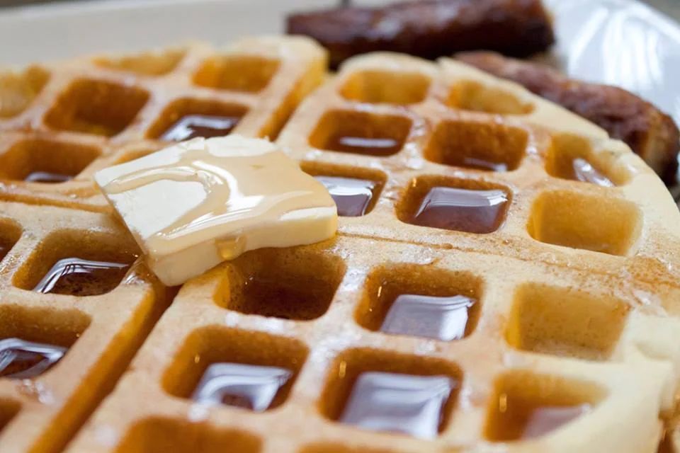A waffle topped with butter and syrup at The Galley in Morgan City.