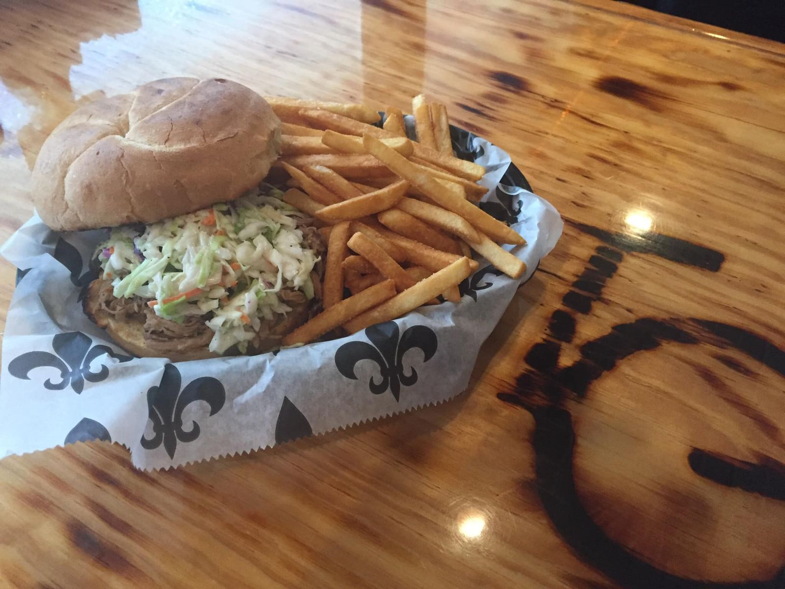 A sandwich served in a basket with fries at The Galley in Morgan City.